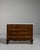 A refined chest combining warm oak with a contrasting marble top. The piece balances durability with elegance, offering...