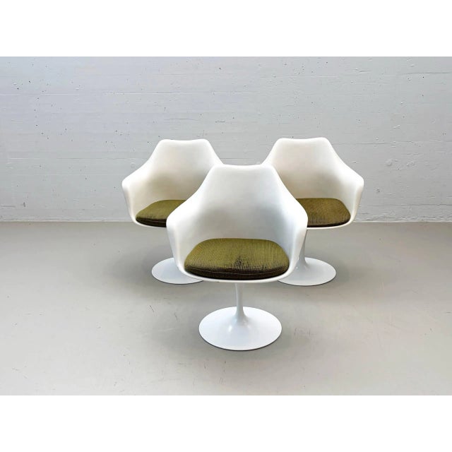 Original tulip armchairs by eero saarinen for knoll international, designed in 1956. these iconic swivel chairs are part...