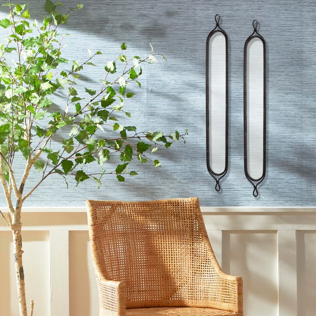 A set of Frenchinspired metal mirrorsvintage in feel and antique black in color. Antique Black Includes hooks for hanging,...