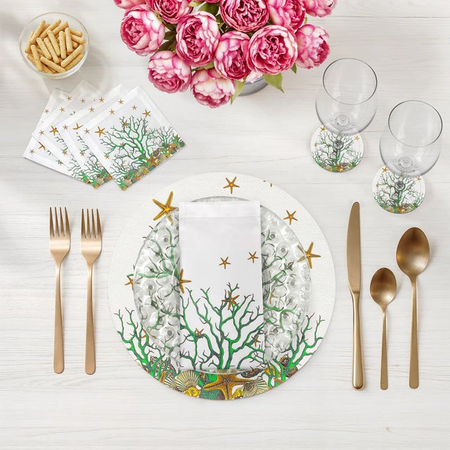 Let the whimsy of the sea wander gracefully into your table with our Coral Reef Vegan Leather Round Pebble Placemat....