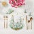 Let the whimsy of the sea wander gracefully into your table with our Coral Reef Vegan Leather Round Pebble Placemat....