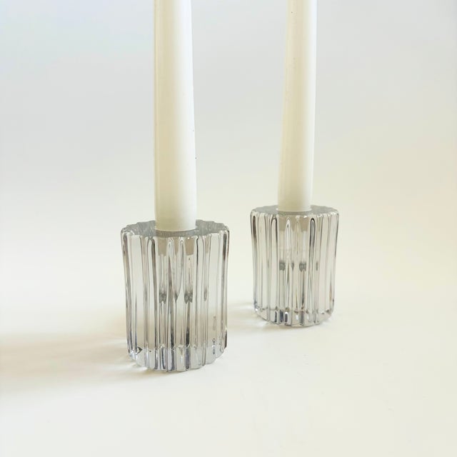 A set of 2 vintage glass candle holders by Heisey. Produced as part of the "Ridgeleigh" line between 1934 to 1943....