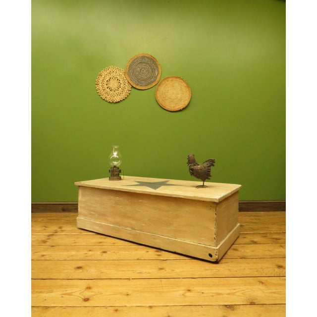 This is a useful large blanket box that dates to the first half of the 20th Century. The box is made of solid pine and is...