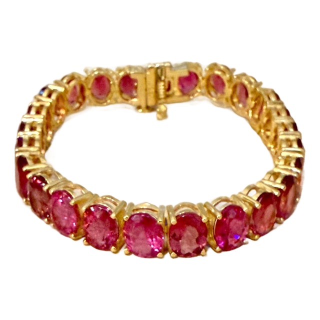48 Carat Natural Fine Oval Pink Tourmaline Bracelet 14 Karat Yellow Gold, 7 Inch For Sale