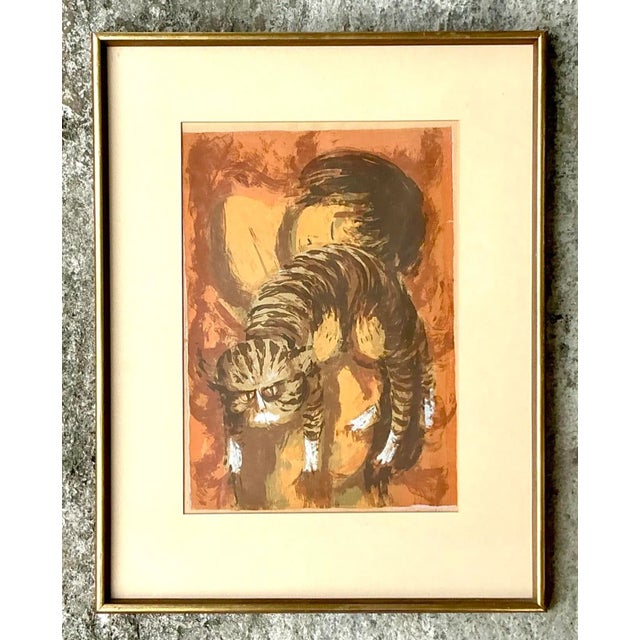 This vintage boho signed original lithograph on paper showcases a unique and expressive portrayal of a cat in earthy...
