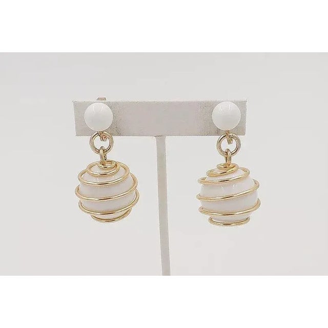 White Vintage Signed Trifari White Spiral Clip Earrings, 1954 Ad Piece - 2 Pieces For Sale - Image 8 of 8
