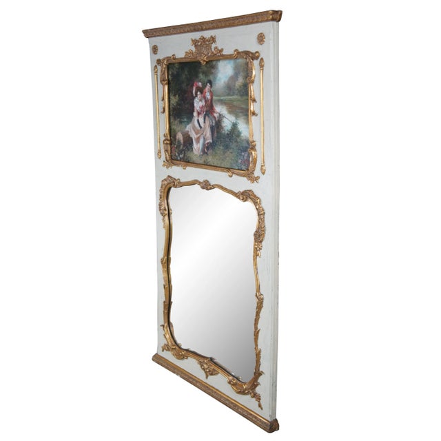 Vintage French Provincial / Louis XV overmantel Trumeau wall mirror. Carved of wood featuring gold gilt designs of florals...