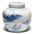 This round, porcelain ginger jar is brightly glazed in the blue-and-white manner. A combination of stenciled linework and...
