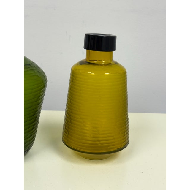 Design Plus Gallery presents a pair of Danish Design Decorative Glass Bottles from BoConcept. The coordinating vessels...