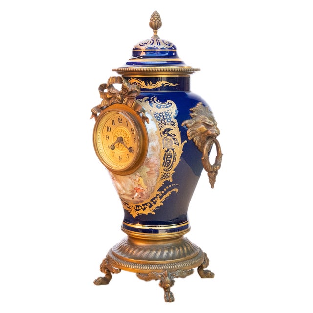 A very elegant 19th century antique French Sèvres cobalt blue porcelain & ormolu mounted urn shaped eight day mantel clock...