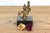 Hand-cast via ancestral lost-wax casting methods, this fascinating micro-sculpture represents an elite category of...
