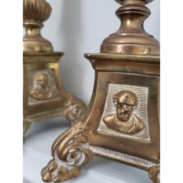 This exceptional pair of late 19th-century French church altar candlesticks balances historical liturgical craftsmanship...