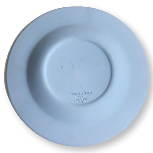 Vintage Wedgwood Jasperware ashtray with their signature Queensware border, and "Cupid as Oracle" scene in the middle....