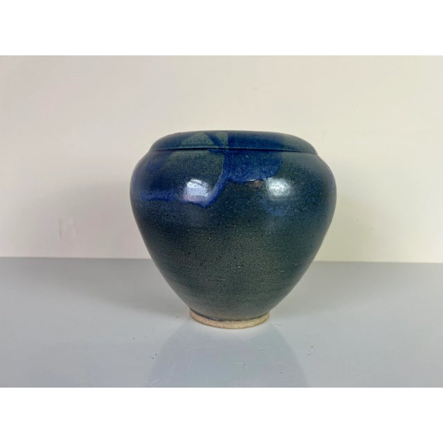 A wonderful Vintage hand made studio pottery vase. Exceptional glaze vase with beautiful colors blue and gray. Signed on...