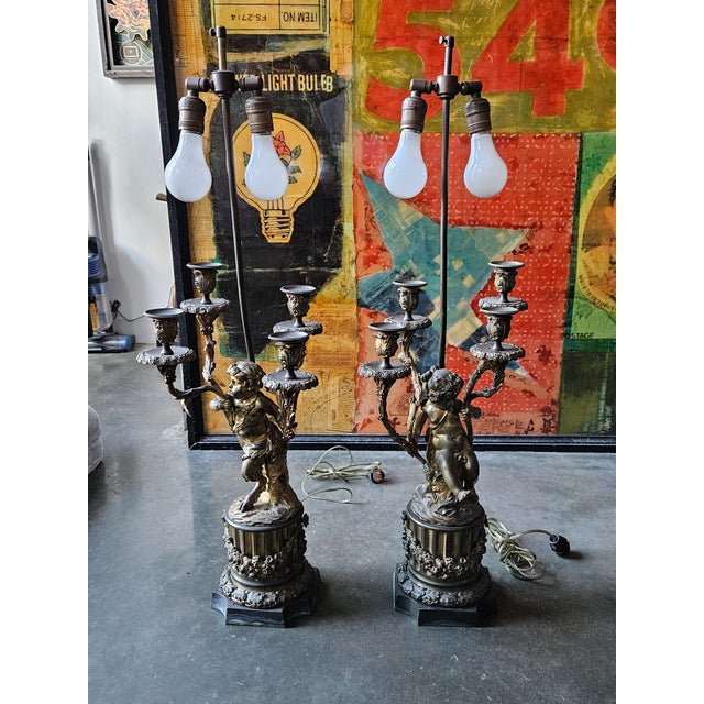 Large 19th C Dore Bronze Putti 4 Light Candelaba - A Pairr sold as found without overt damage drilled and made into lamps...