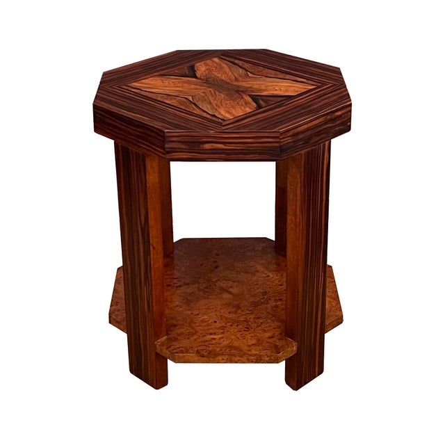 the period Art Deco table featuring an octagonal top centering a quarter veneered medallion with a Macassar border; raised...
