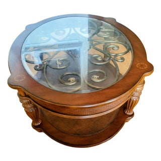 Antique Wooden Coffee Table Featuring a Glass Top, Bronze Ornamentation, and Two Tiers. For Sale