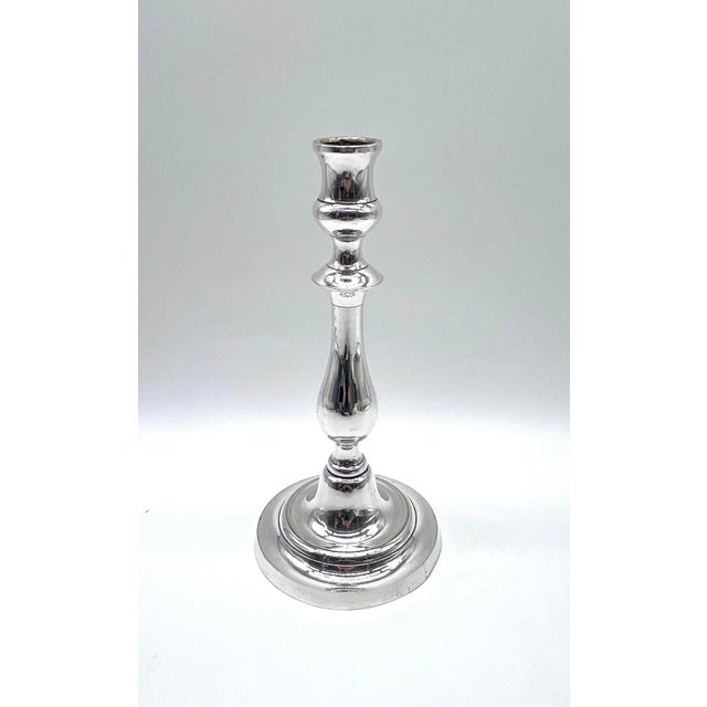 An elegant, antique candlestick by the renowned french silversmith félix chéron, made in paris in the second half of the...