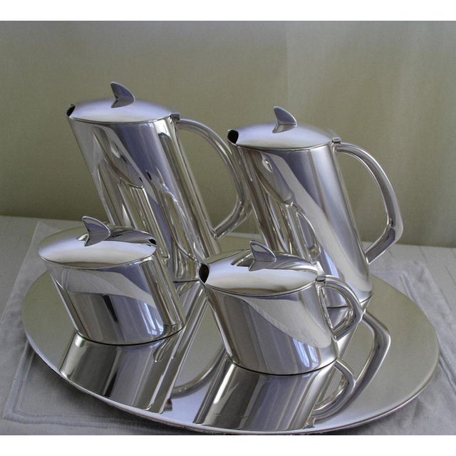 Ref # 190 9910 02 New, Not Used Photo 239 Oval Tea Pot, Large, Quintessence Description: A Wonderful Contemporary Oval Tea...