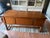 Solid oak library desk with a finished, paneled back — a partners-desk detail that lets it stand freestanding in a room...