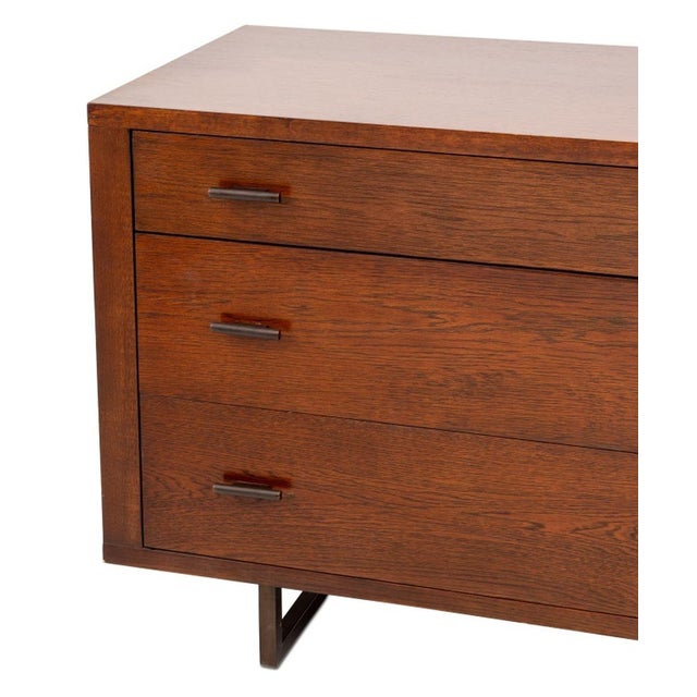 Mid-Century Modern Style Stained Wood Sideboard, with two sliding doors opening to right and three frieze drawers to left,...