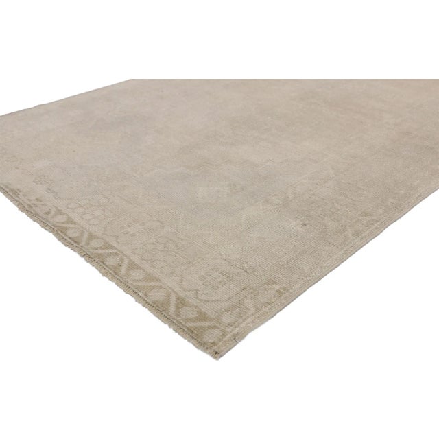 Vintage Turkish Oushak Rug 03'08 x 06'05. Showcasing an elegant rustic style and muted colors this hand-knotted wool...