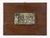 Wood base with brass relief is an original decorative object realized in the early 20th century. Made in Italy. The base...