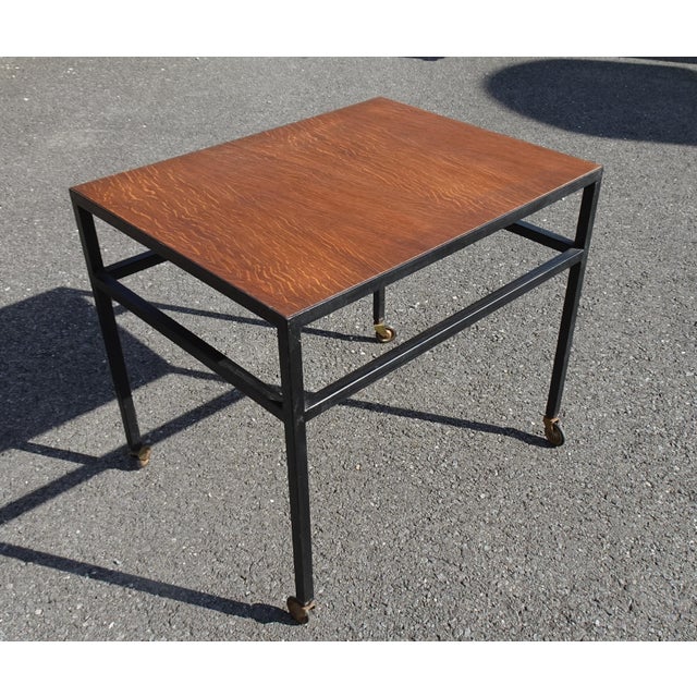 Vintage Teak and Black Lacquered Metal Rolling Table, 1960s, in Good conditions. Designed 1960 to 1969