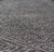 Measures 6 x 9 This modern Indian area rug features an abstract design loosely resembling a crosshatch design. The field...