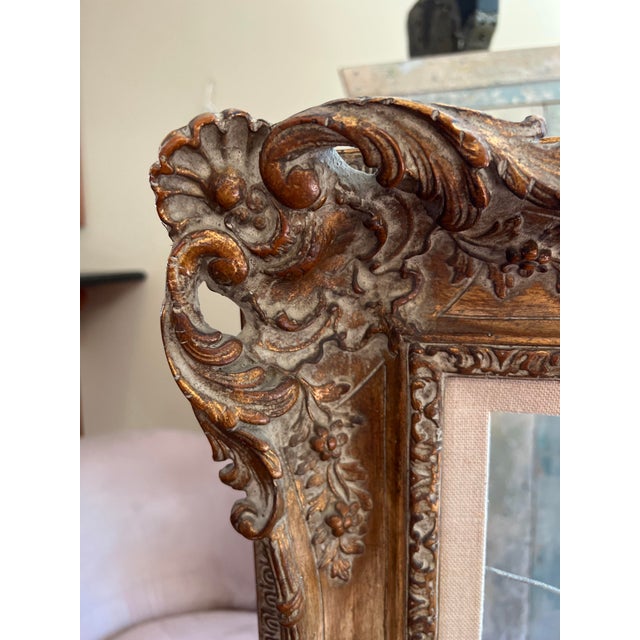 A striking and highly decorative antique frame, likely French, dating to the late 19th century and executed in the...