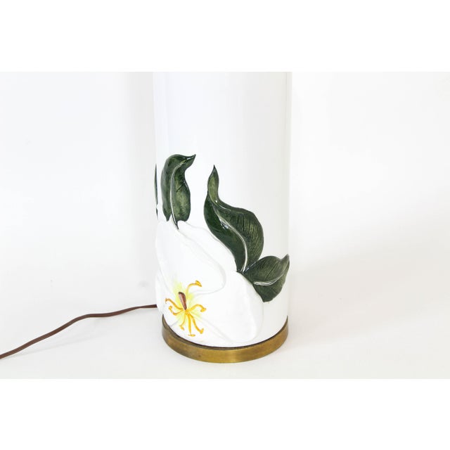 Mid Century ceramic table lamp with Lily Motif This stylish lamp is wired and in working codition Dimensions; 6.5"Width x...