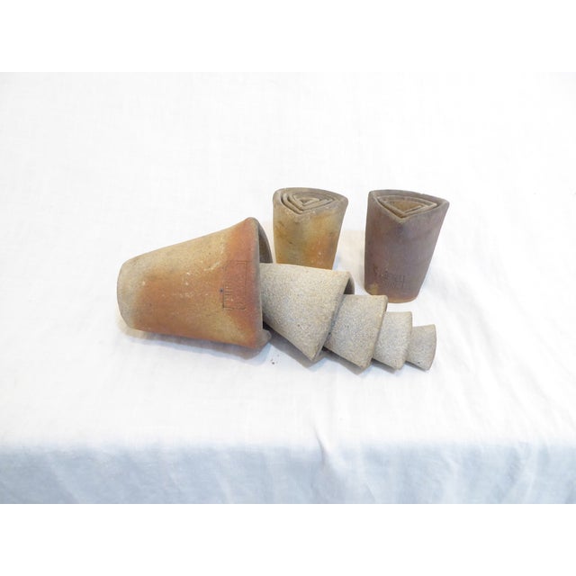 This set of three nested crucibles was used by a Boston 19th Century muralist to mix paints using pigments. There is a...