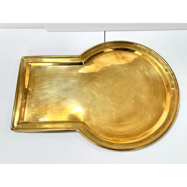 A stunning tray with a unique shape. I believe it’s Russian, though I was unable to place the hallmark. The brass has a...