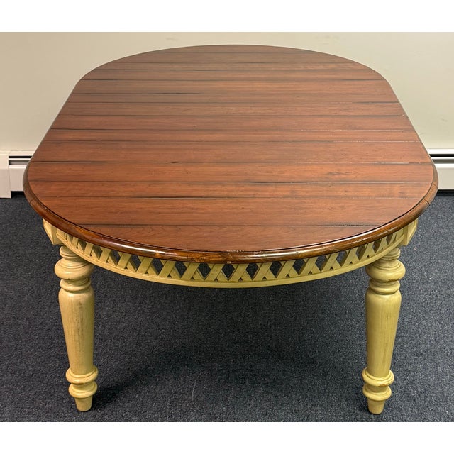 Beautiful farmhouse style dining table by Hooker furniture. Features a rustic planked top in a rich walnut finish that...
