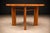 Designed in the 1950s by Joaquim Tenreiro, this exceptional round dining table represents a mature expression of Brazilian...