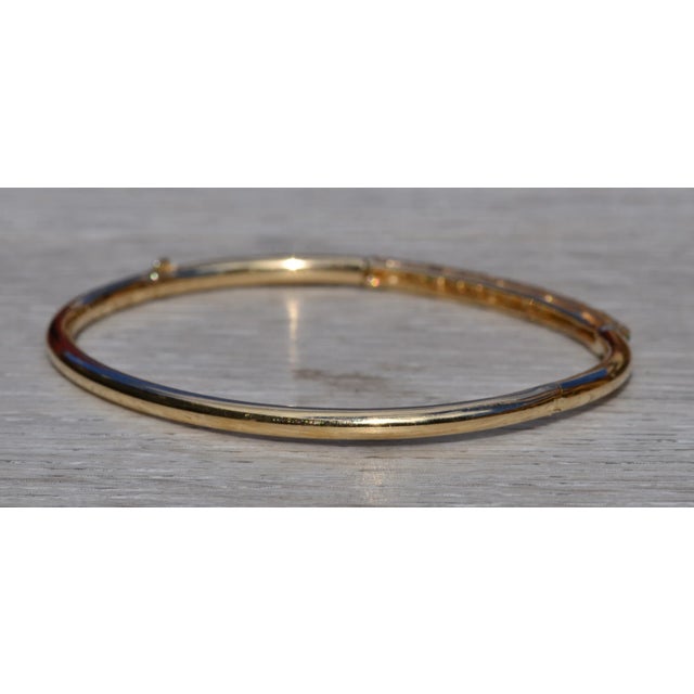 Metal The Claridon Deux: Ladies 14K Yellow Gold Emerald and Diamond set Bangle Bracelet For Sale - Image 7 of 11