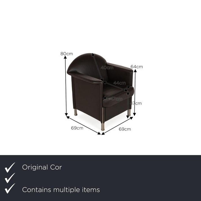 The Logo armchair set from Cor is covered with brown genuine leather and stands on silver metal feet. It is characterized...