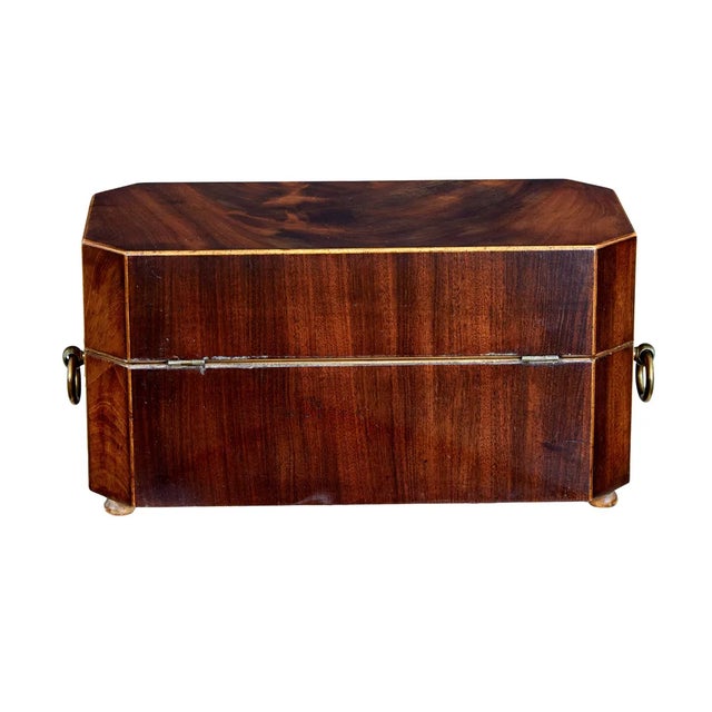 "Early 19th century regency mahogany tea caddy circa 1820. Made using flame mahogany veneers. Brass handles with star...