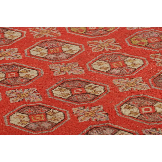 Hand-knotted in wool and originating in East Turkestan circa 1930-50, this 6x11 Vintage Samarkand Rug is among the most...