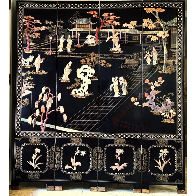 This beautiful Chinese export four panel coromandel screen displays ladies in courtyard with pavilion, trees and flowers....