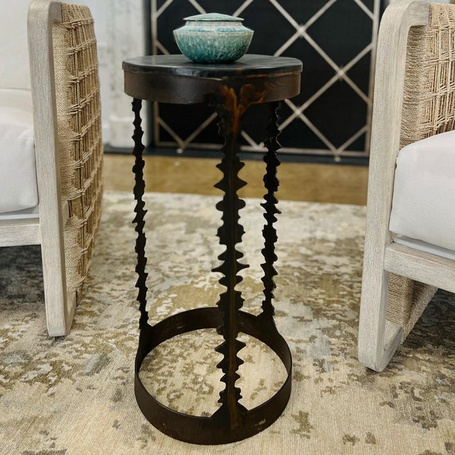 The Rocco Drinks Table is an organic modern side table that merges sculptural artistry with functional design. Hand-forged...