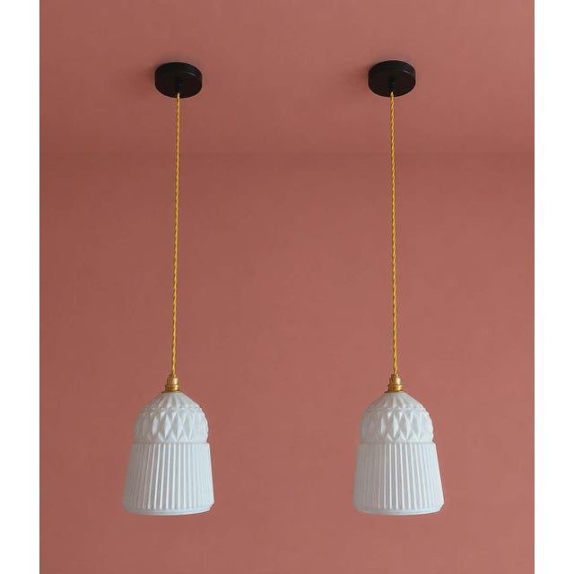 Stunning white molded glass pendant light with geometric patterns. Electrically wired: E14 brass socket, bright yellow...