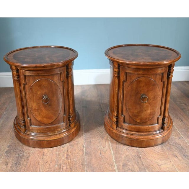 You are viewing a pair of refined Regency Revival bedside chests in walnut Unusual with the round form Each cabinet...