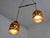 Ceiling lamp with two copper and glass light fixtures by Nanny Still for Raak from the 1960s. Diameter of the light...