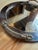 Elegant Italian mid-century oval serving tray crafted in the 1970s, featuring a polished silver-plated surface accented by...