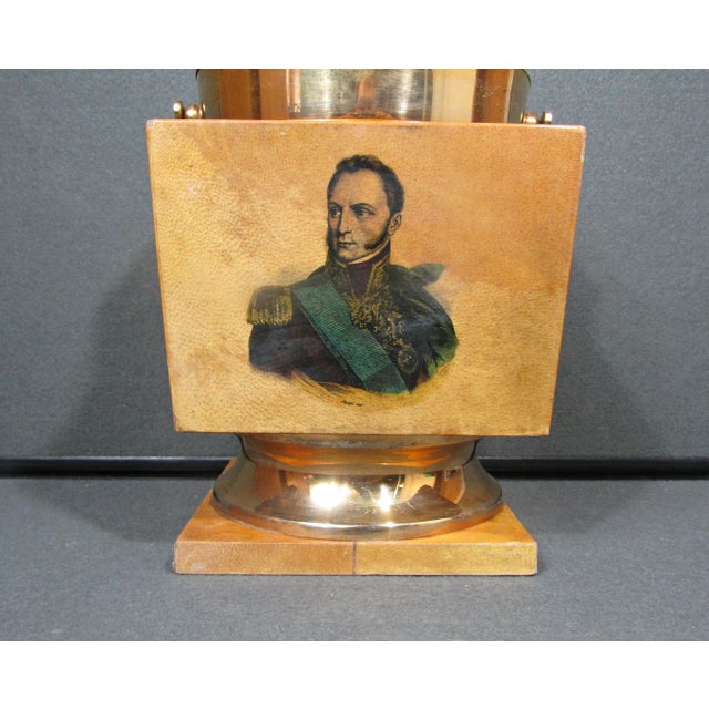 A wonderfully unusual Italian mid-century ice bucket in the manner of Aldo Tura, combining warm parchment-toned surfaces...