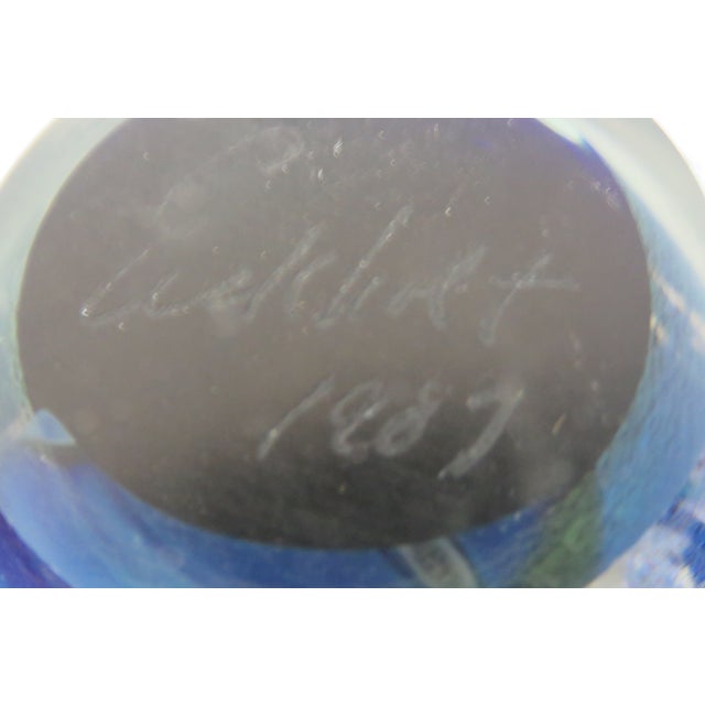 This beautiful Paper Weight is made of art glass. This stunning decorative paperweight is signed as being made by Robert...