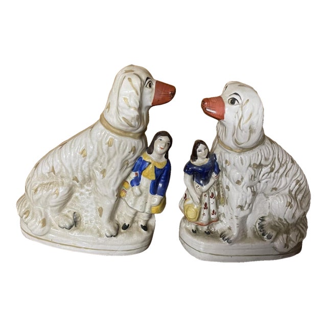 One Pair of Antique Staffordshire Dogs With Children For Sale