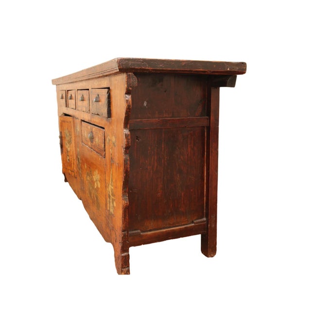 Antique Chinese altar style cabinet or coffer in vibrant honey-brown distressed lacquered finish, aged patina with hand-...