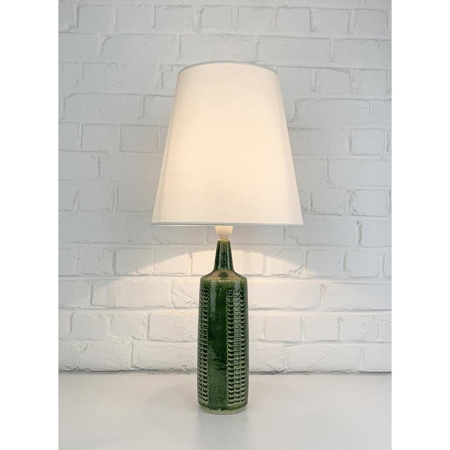Tall ceramic table lamp model DL-27 created by Annelise and Per-Linnemann-Schmidt. It has been produced by Palshus...